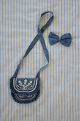 Small Embroidered Bag and its Denim Hair Bow