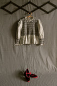 Woman Black & Ivory Striped Smocked Blouse