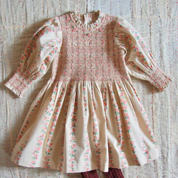 Smocked Dress with a Garland of Flowers