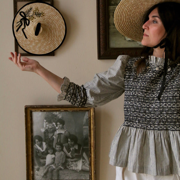 Woman Black & Ivory Striped Smocked Blouse