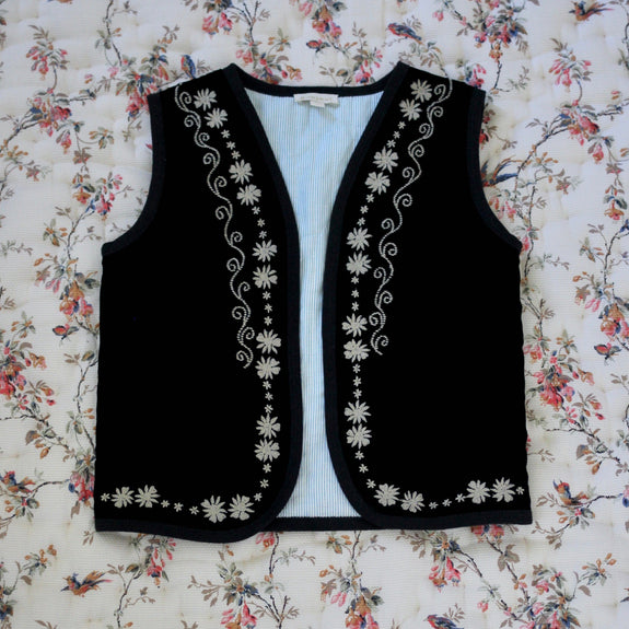 Black velvet sleeveless vest