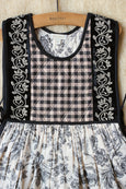 Pinafore dress with wallpaper print