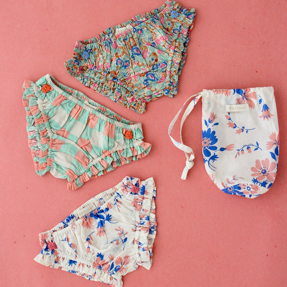 Set of 3 panties sold in a small blue white pink bouquet bag